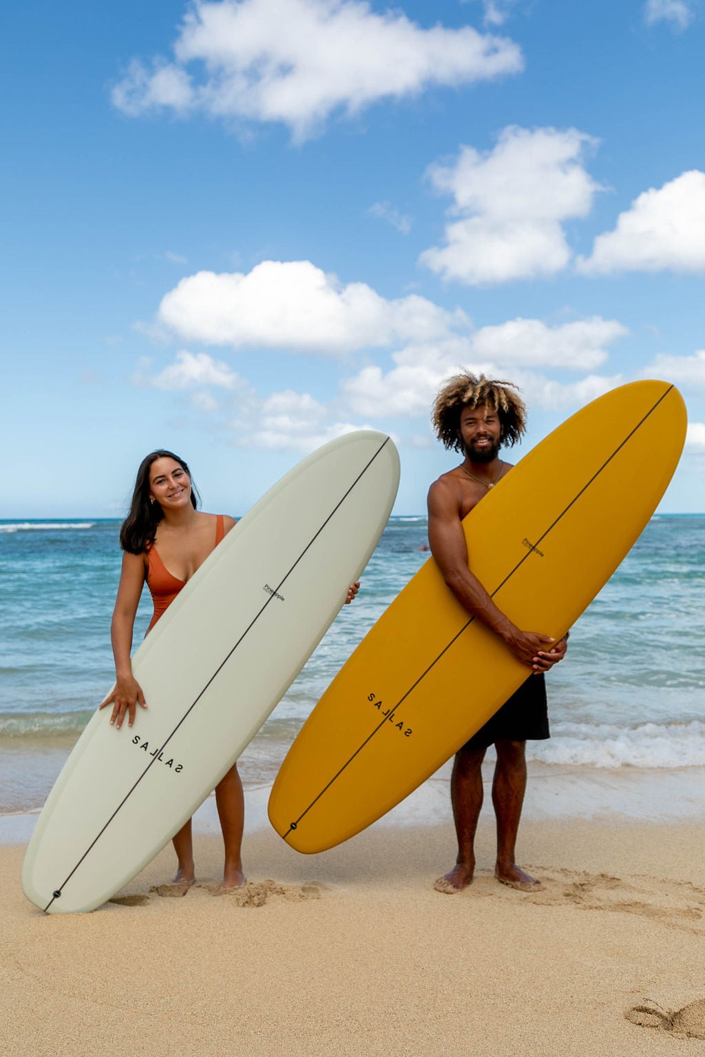 Surfing's best Longboards shaped by World Champ Kai Sallas +